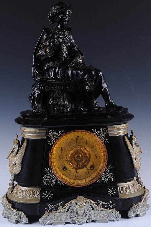 ANSONIA POMPEII STATUE MANTLE CLOCK: With spelter figure of an artist, double sunk brass dial, cast iron case, signed on the movement. Measures 22 x 15 x 7 Inches. We ship in-house for all but very large and or very fragile items and som