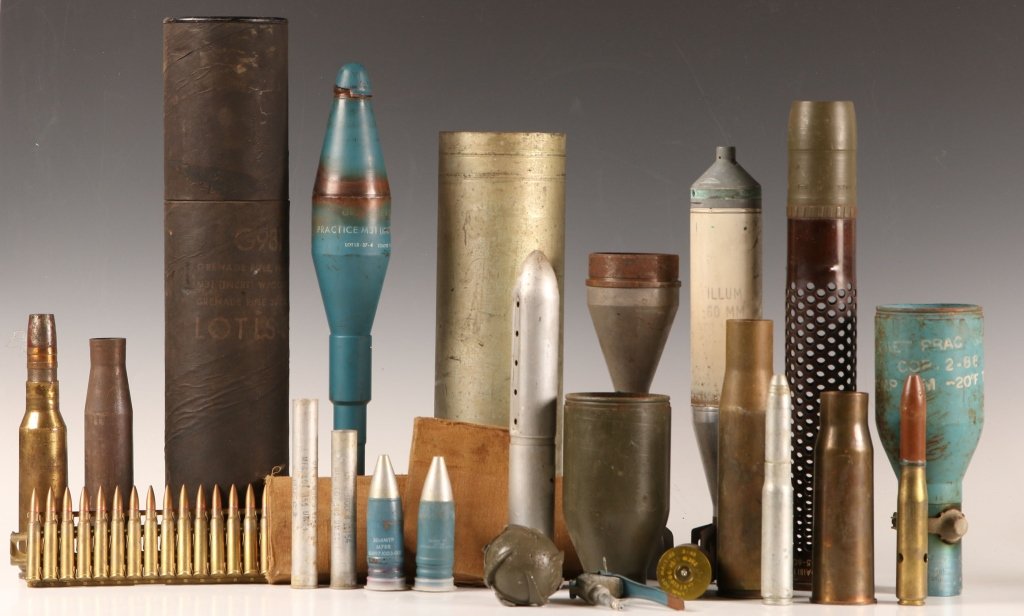 ELEVEN PIECE COLLECTION OF MILITARY ORDNANCE: Interesting assortment of parts and pieces and possibly experimental items. Lot consists of rifle grenade model M31 this is an inert training round in the original cardboard carrier or tube cylinder, 
