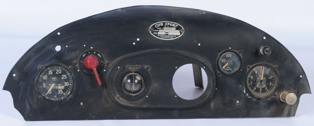 CUB SPORT AIRCRAFT INSTRUMENT PANEL WITH GAUGES: Contoured black aluminum finish instrument panel fitted with large Cub Sport model 13 nomenclature plate, Rear Seat for Solo Flying, Piper Aircraft Assoc. Has magneto switch, primer pump, one push pul