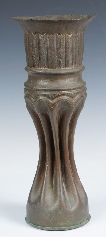 WWI TRENCH ART SHELL - LARGE: Large brass casing has been fluted at the bottom with ornate designs and ribbed top with flared lip, bottom reads it's a Model 1906 for a 4.71 gun and bears American inspector marks. Very unusual piec