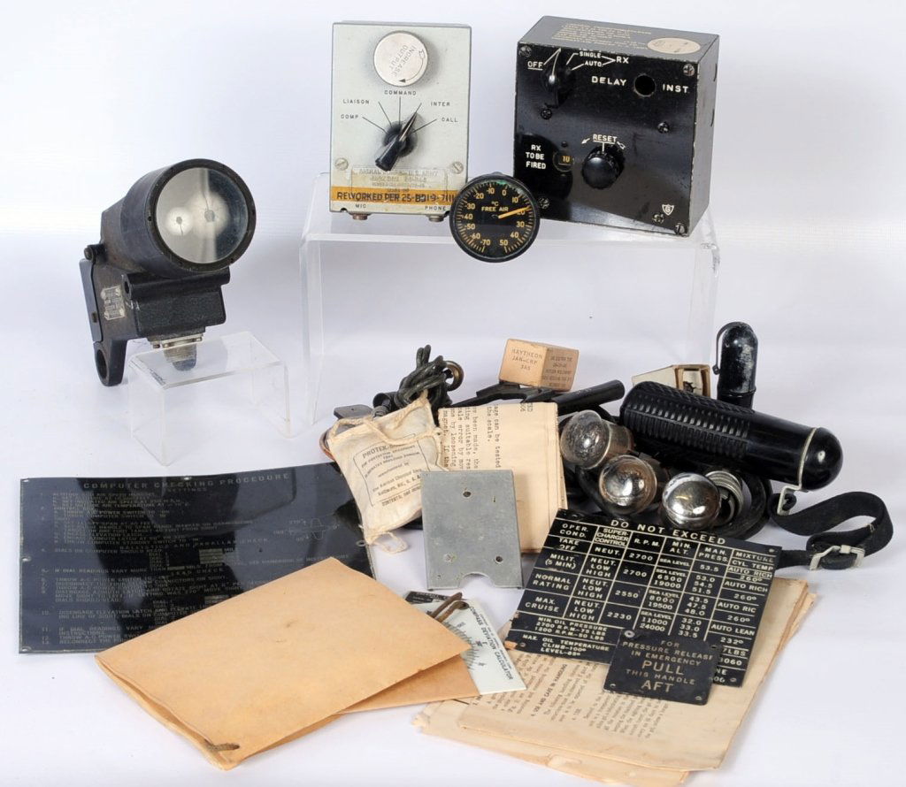 ASSORTED WWII ERA AIRCRAFT AND RADIO MEMORBELIA: Interesting lot consists of Type N3C Army Air Force gun sight assembly, has a large optical lens similar to telescope or binoculars, appears to lack some fittings. Control projector release type A2 WW