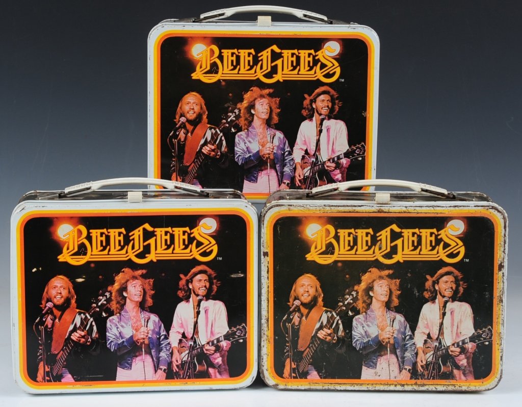 THREE BEEGEES(1978) LUNCH BOXES: Complete set. Reverse images feature each band member; Maurice Gibb, Robin Gibb and Barry Gibb. All three include matching plastic thermoses.