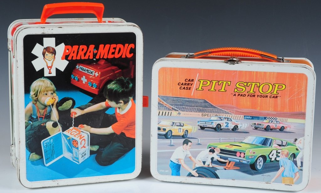 PARA-MEDIC PLAYSET AND PIT-STOP CAR-CARRYING CASE: Pit-Stop(1968) metal box for carrying toy cars with cardboard car separator and art to the inside of the lid. Para-Medic toy opens on both sides with paper and plastic defibrillator and phone with art