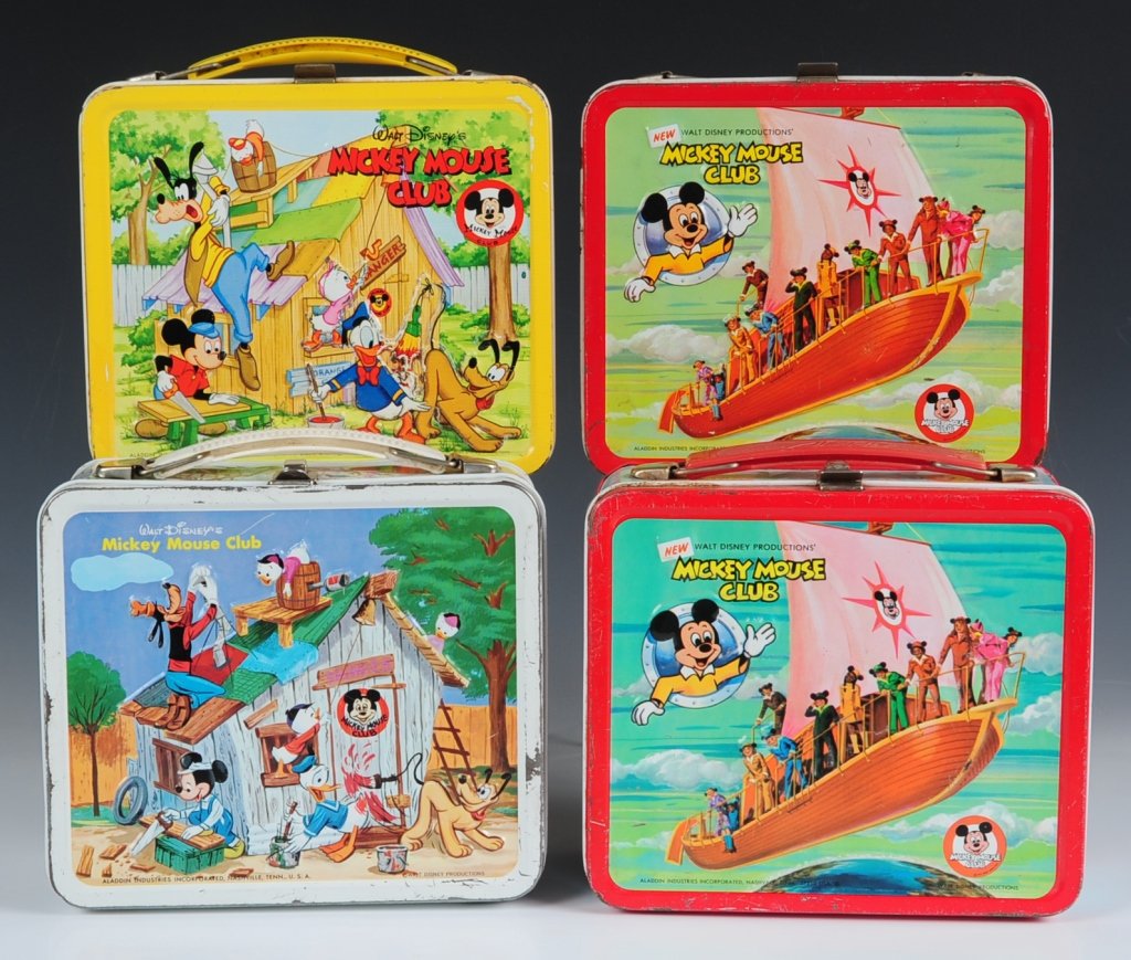 FOUR MICKEY MOUSE CLUB LUNCH BOXES: Includes Mickey Mouse Club clubhouse white-rim(1967) with two matching tin-litho thermoses, Mickey Mouse Club clubhouse yellow-trim(1963) with matching plastic thermos and Mickey Mouse Club sky boat r