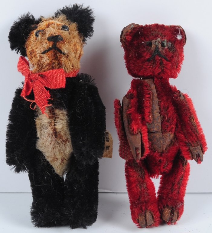 TWO ANTIQUE TEDDY BEARS INCLUDING UNUSUAL RED MOHAIR: Two small jointed mohair teddy bears with fully jointed head and body. Measure 3.5 and 3.75 inches.