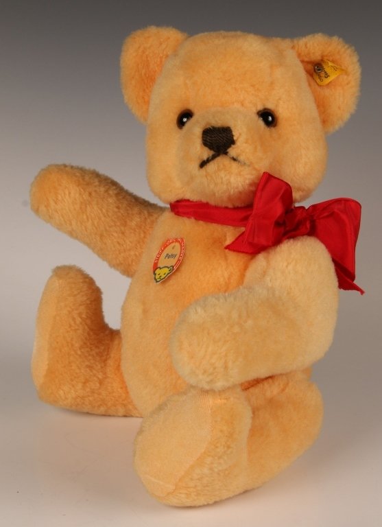 CIRCA 1970 STEIFF DRALON PETSY BEAR: 0241/38, button in ear with yellow tag, paper chest and hang tags, measures 14 inches (38 cm).
