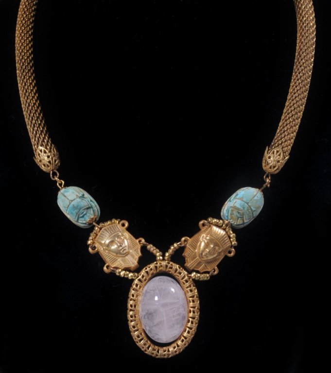 VINTAGE MIRIAM HASKELL EGYPTIAN MOTIF NECKLACE: With faux turquoise and quartz scarabs, goldtone pharaoh masks, mesh chain, marked with a tag near the clasp, necklace measures 17.5 inches.