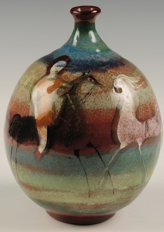 POLIA PILLIN (1909-1992) ART POTTERY BOTTLE: A bulbous body with pinched neck and flaring rim, signed on the base, measures 8 x 5.5 inches. ?We are happy to offer in-house shipping for all but very large or very fragile items. Some international