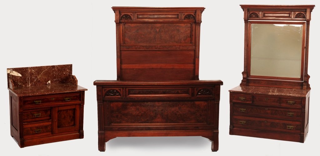VICTORIAN MATCHING THREE PIECE BEDROOM SET: Walnut bedroom set with burled panels and carved decoration. A beveled 'Diamond Dust' mirror on the dresser. With carved and burled headboard that measures 75 x 65 inches, marble top washstand 37 x 34
