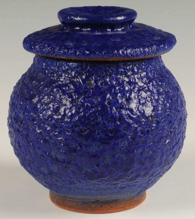 HARDING BLACK (1912-2004) POTTERY JAR IN VOLCANIC BLUE: A covered jar in thick blue volcanic glaze, dated 1987. Measures 6 x 5.5 inches diameter. ?We are happy to offer in-house shipping for all but very large or very fragile items. Some international orde