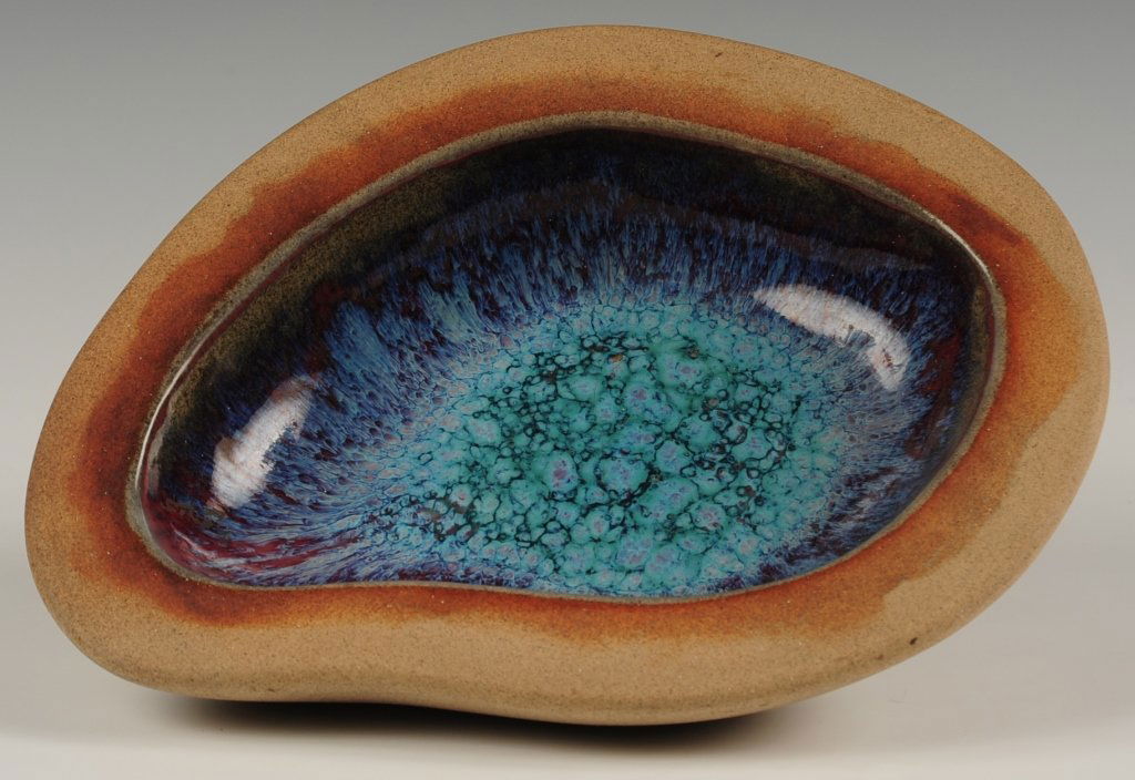 HARDING BLACK (1912-2004) ASYMMETRICAL POTTERY DISH: Heavy stoneware bowl or ashtray dated 1954 and signed on the base, measures 2.25 x 10 x 8 inches. ?We are happy to offer in-house shipping for all but very large or very fragile items. Some internatio