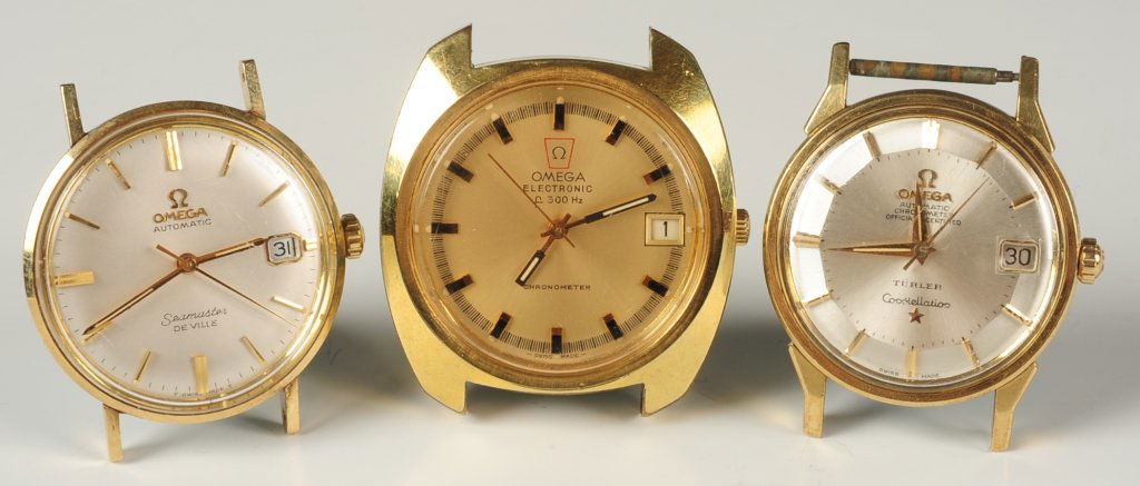 THREE VINTAGE OMEGA WRIST WATCHES INCL CONSTELLATION: Three watches which includes an Omega Automatic Seamaster Deville, Omega Electronic F 300 Hz and a day date pie pan face Omega marked on the dial, Omega Automatic Chronometer Official Certified Turler