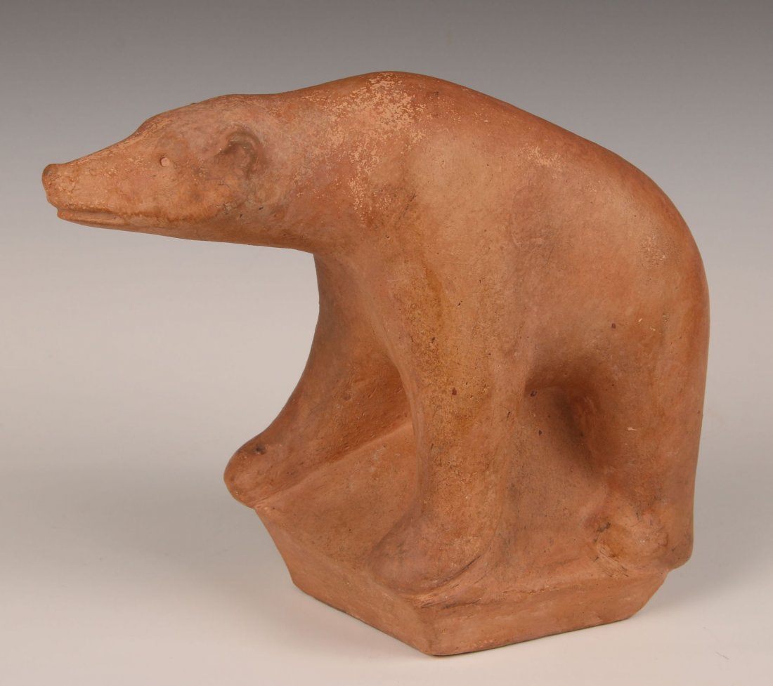 WAYLANDE GREGORY (1905 - 1971) TERRA COTTA PROTOTYPE: A heavy terra cotta sculpture created by Waylande Gregory as a prototype model for identical figures produced by Gregory following his years at Cowan Pottery in Lakewood Ohio. An identical porcelain m