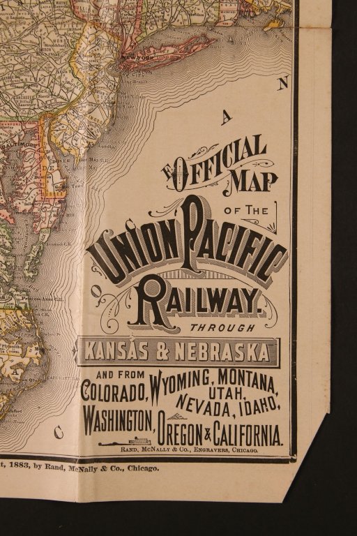1883 UNION PACIFIC RAILWAY TIME TABLE: System time table including write-ups on points of interest in the route, opens up to a large colored map that fills the whole of the reverse side of the page. We are happy to offer in-house shipping 