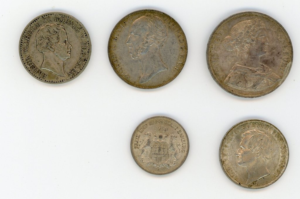 FIVE 19TH CENTURY COINS, 4 GERMAN, 1 NETHERLANDS: 2 Mark coin from Hamburg dated 1876. 1 Thaler from Prussia 1832. 1 Thaler from Saxony-Albertine 1870. 1 Doppeltaler from Frankfurt 1861. 2 1/2 Gulden from the Netherlands 1843. Circulated condition. W