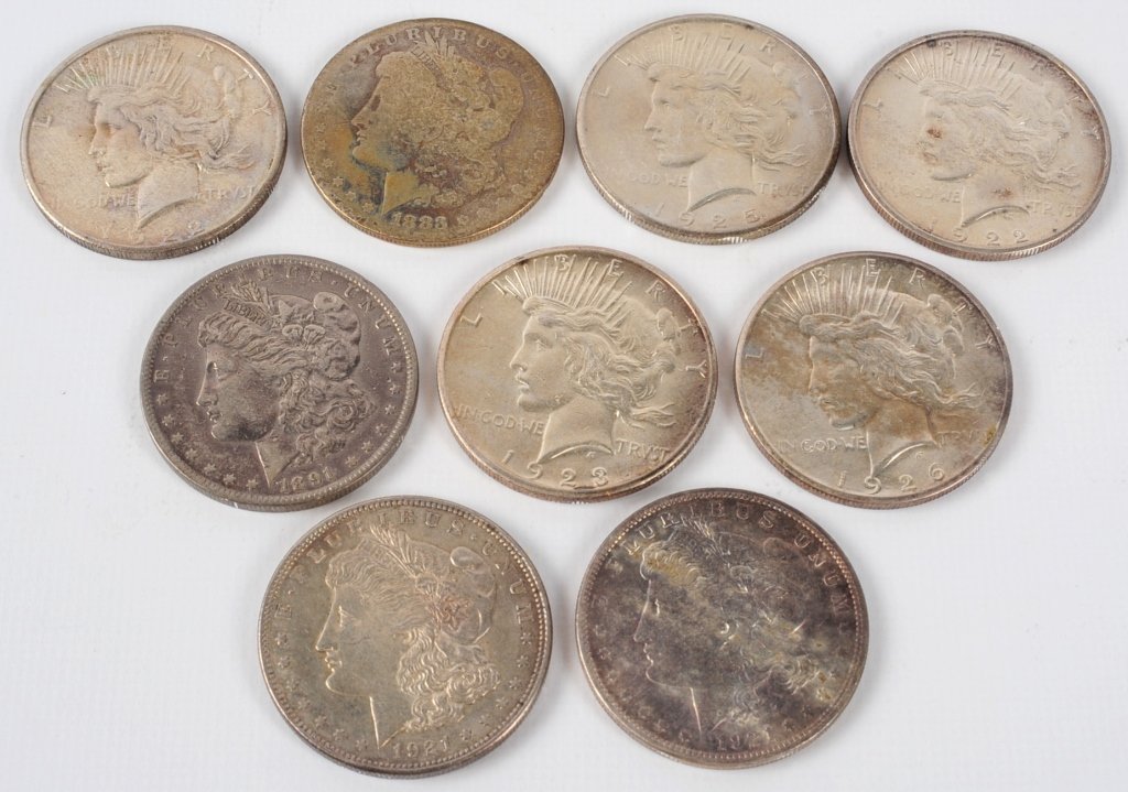 NINE SILVER DOLLARS 1889-1926, 4 MORGANS, 5 PEACE: Silver Dollars, 1883, 1891-O, 1921, 1921-S, 1922-S, 1922-S, 1923-S, 1925, 1926-S. Circulated condition. We are happy to offer in-house shipping for all but very large or very fragile items. Some inter