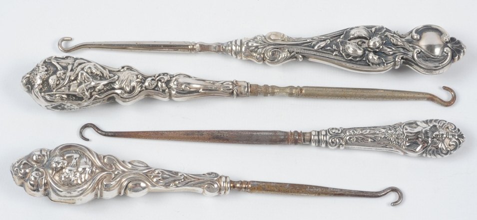 LOT OF ART NOUVEAU STERLING HANDLE BUTTON HOOKS: Four antique button hooks with weighted sterling handles, one unmarked, the rest marked sterling, measure from 7 to 8.25 inches. This lot is not from the Mundwyler-Moulthrop estate. We are happy to of