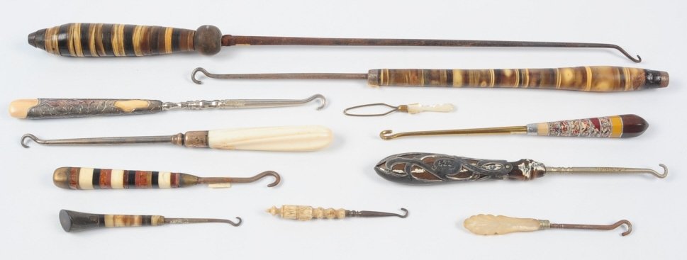 LOT OF BUTTON HOOKS IN WOOD, HORN, SEMIPRECIOUS, ETC: Eleven antique button hooks with handles from inlaid wood, bone, horn and semiprecious stone. One marked Gorham Sterling with a bone handle. Measures from 2.75 to 16 inches. This lot is not from the M