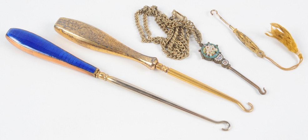 LOT OF UNUSUAL ANTIQUE BUTTON HOOKS: Lot includes: a micro-mosaic pendant button hook on a chain necklace; a German enameled copper button hook; a miniature enameled pocket knife style button hook; a trench art button hook made from a bu