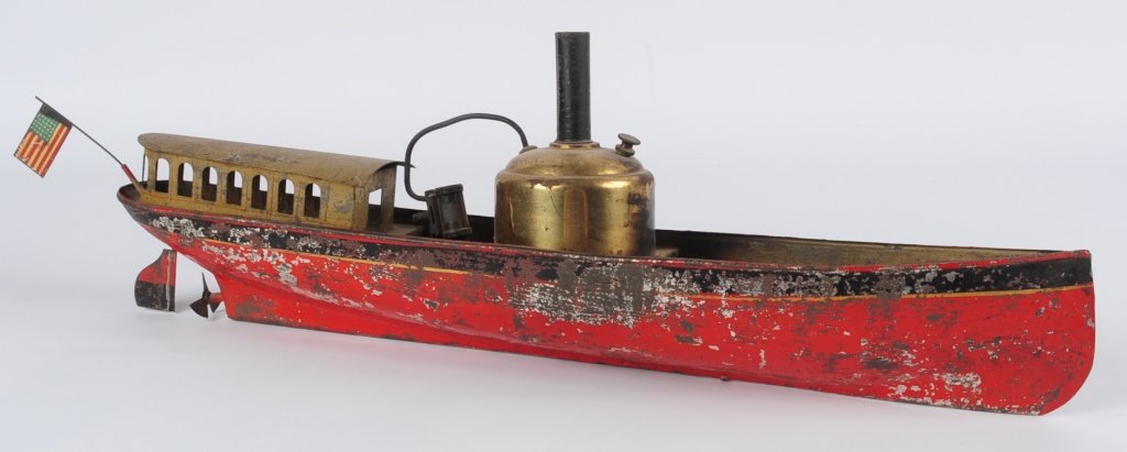 C. 1900 SCHOENNER LIVE STEAM TOY RIVER BOAT: Horizontal boiler, tin burners, retains it's tin litho American flag, measures 6 x 18 inches. We are happy to offer in-house shipping for all but very large or very fragile items. Some international o