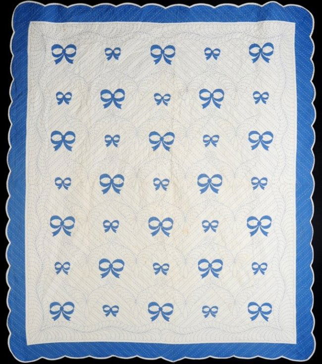 QUILT, VINTAGE DRESS AND ANTIQUE TABLE LINENS: Blue and white quilt with appliqué and embroidered quilting, measures 90 x 78 inches, good, no fraying or holes, scattered stains; Vintage embroidered satin dress, label reads 'Original Chechoslovak