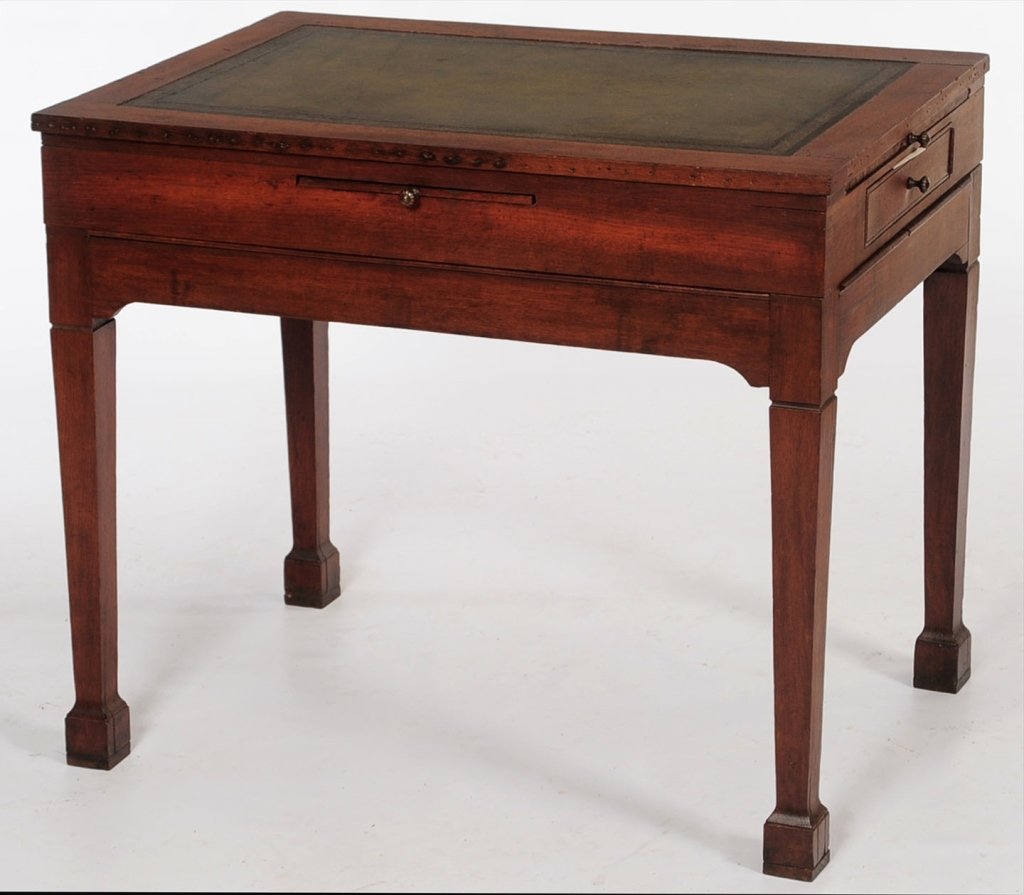 19TH CENTURY OAK DRAFTING TABLE: Rectangular form with hinged gilt tooled green-leather top and ratcheting device to raise and tilt for various heights, case fitted with single long drawer fitted with oval brass pulls, one side with 
