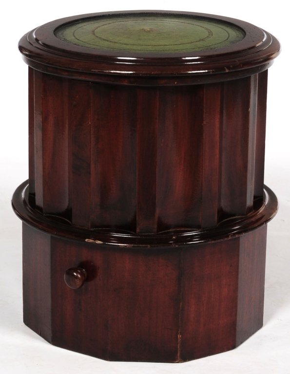 ANTIQUE ENGLISH ROUND FLUTED MAHOGANY COMMODE: With green leather inset lift top. Measures 19 x 16.5 inches.We are happy to offer in-house shipping for all but very large or very fragile items. Some international orders may need to be handled by a