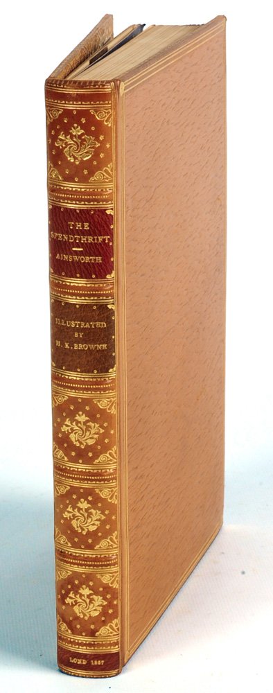 1857, WILLIAM AINSWORTH, 'THE SPENDTHRIFT': William Harrison Ainsworth, 'The Spendthrift,' illustrations by Hablot K. Browne, 332 pp. published London 1857. Rebound full leather with raised bands and top edge gilt. Old spines and covers bound i