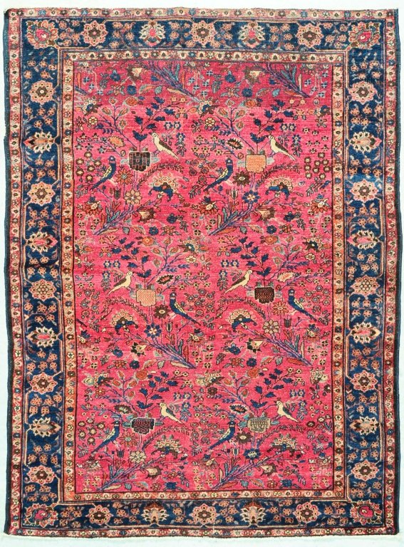 1930S PERSIAN PICTORIAL RUG WITH FLORALS AND BIRDS: The field with floral sprays and pairs of perching hooded hunting falcons, painted background color of field. Measures 52 x 71 inches.We are happy to offer in-house shipping for all but very large or 