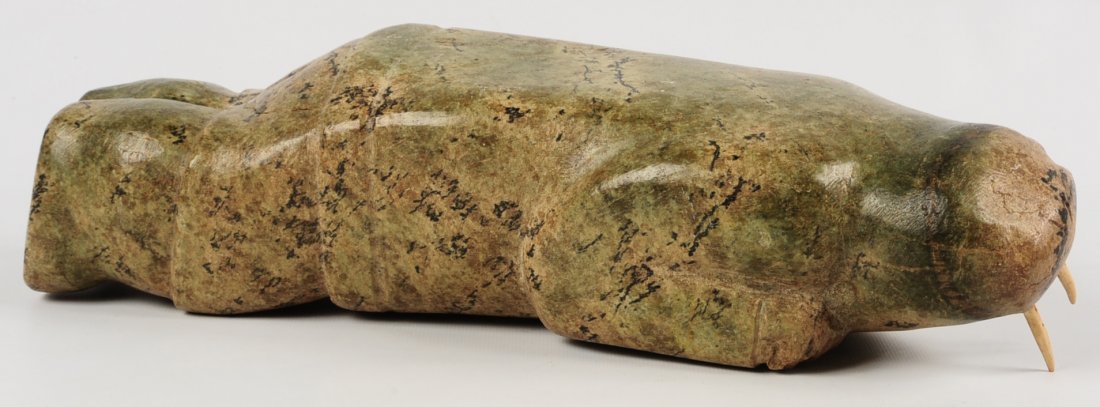 SOAPSTONE FIGURE OF WALRUS WITH HUMAN CHARACTERISTICS (1 of 9)
