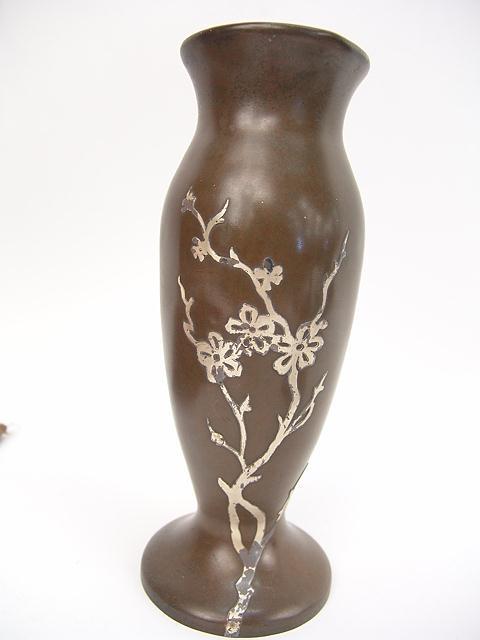 SILVERCREST BRONZE & STERLING VASE #1016 10 x 3.75: SILVERCREST BRONZE & STERLING VASE #1016 10 x 3.75 inches. Bottom dent and top rim misshapen.