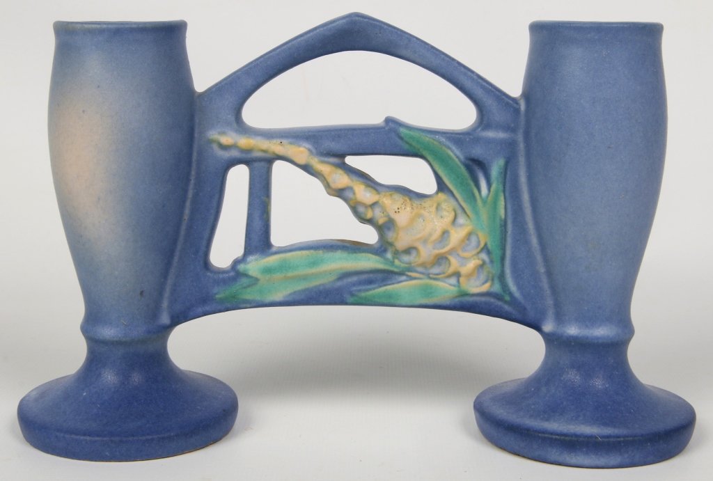ROSEVILLE BLUE FOX GLOVE DOUBLE BUD VASE: Embossed marks on the base ROSEVILLE and U.S.A. 160-11 1/2. Measures 5 x 8 inches at the widest point. We are happy to offer in-house shipping for all but very large or very fragile items. Some intern