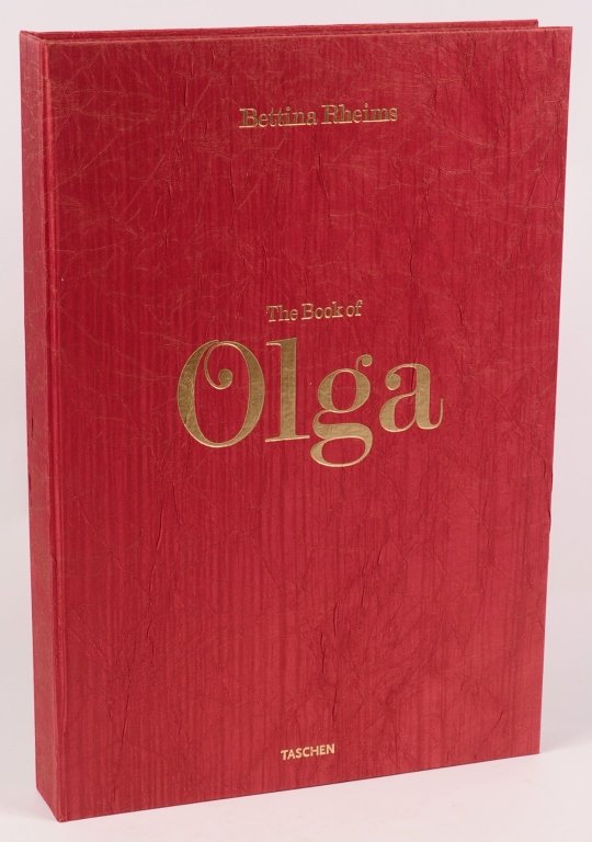 BOOK OF OLGA, BETTINA RHEIMS, TASCHEN, 2008. SGND #'D: By Bettina Rheims, Taschen, Paris, 2008. Cloth hardover, 1st edition, numbered 136/1000 signed by Bettina Rheims, introduction by Catherine Millet, in clamshell box, 17.5 x 12 inches, 154 pages. We ar