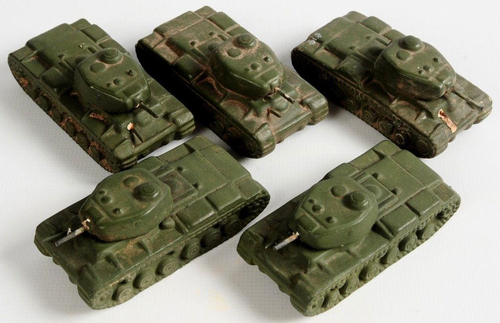 FIVE GOEBEL KW85 SAND TABLE TANK MODELS: Five ceramic tanks with rotating turrets, marked Kw85, with crowned marked turret bases. Approximately 2-3/4 x 1-1/4 inches. We are happy to offer in-house shipping for all but very large or very frag