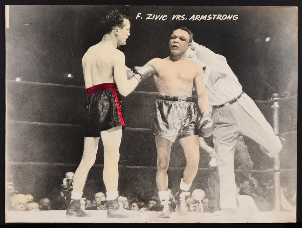 C. 1940 HAND COLORED PHOTO OF BOXERS ZIVIC - ARMSTRONG: Print from a 1940 photo, 'F. Zivic vrs. Armstrong, mounted on chip board, measures 40 x 30 inches.