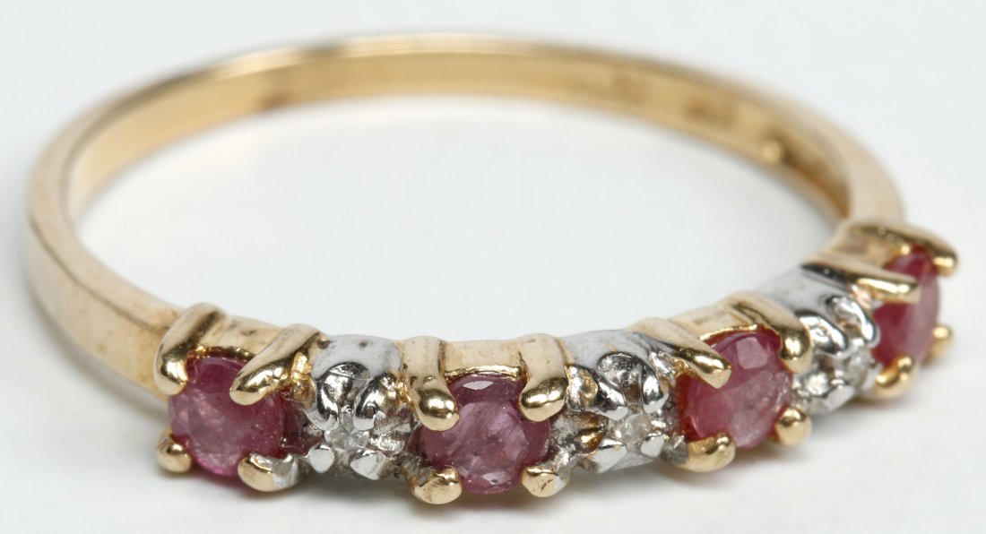 A LADIES 10K YELLOW GOLD RUBY AND DIAMOND BAND (1 of 6)