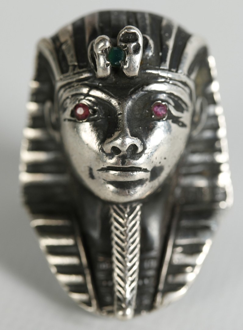 A STERLING SILVER EGYPTIAN PHAROH RING (1 of 2)