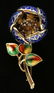 AN ANIMATED 14K ENAMEL FLOWER BROOCH WITH DIAMONDS