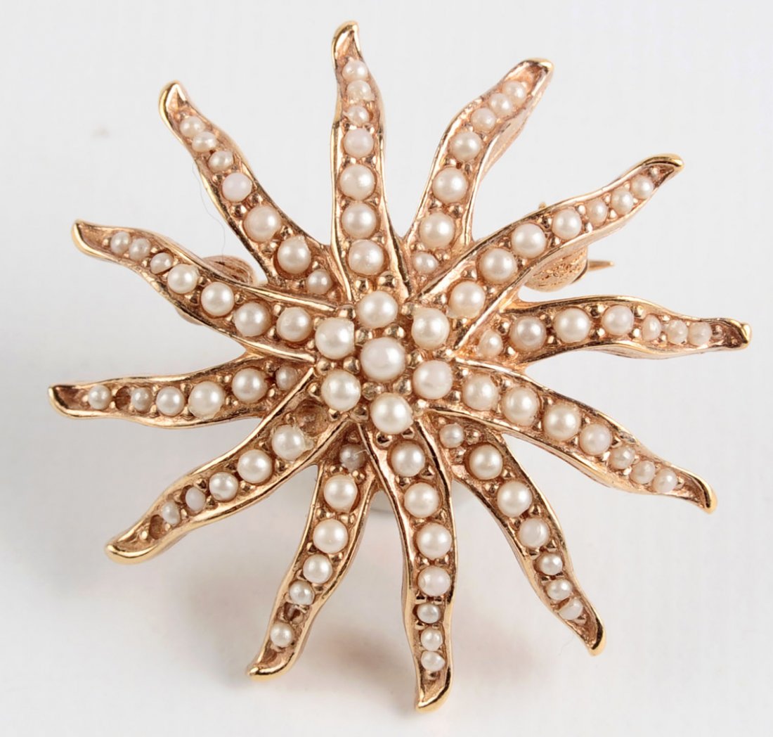 A VINTAGE STARBURST BROOCH SIGNED CINER: Signed on the back, goldtone with white seed beads, measures 1.25 inches. We happily provide seamless, low-cost in-house shipping on nearly everything we sell. Shipping and handling for this lot will