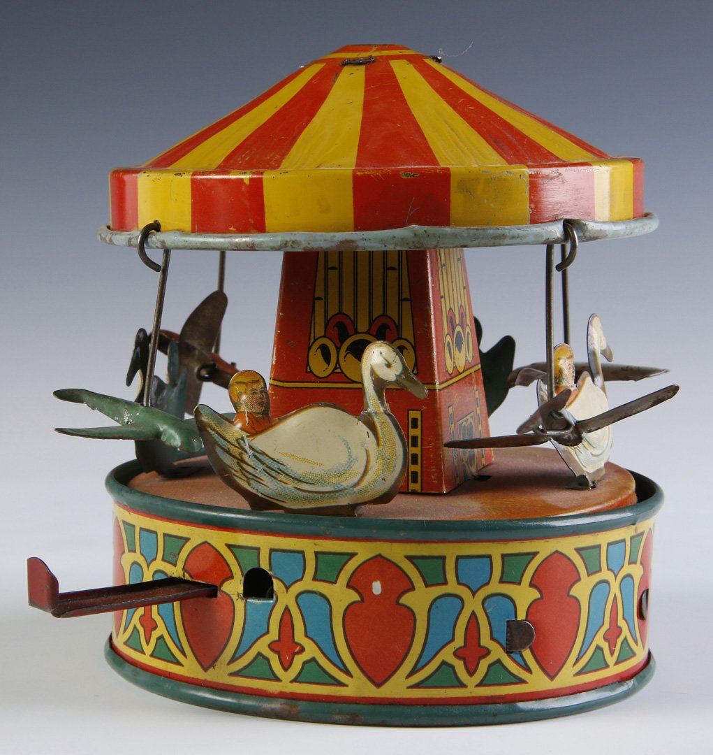 WYANDOTTE TOYS TIN-LITHO LEVER CAROUSEL (1 of 9)