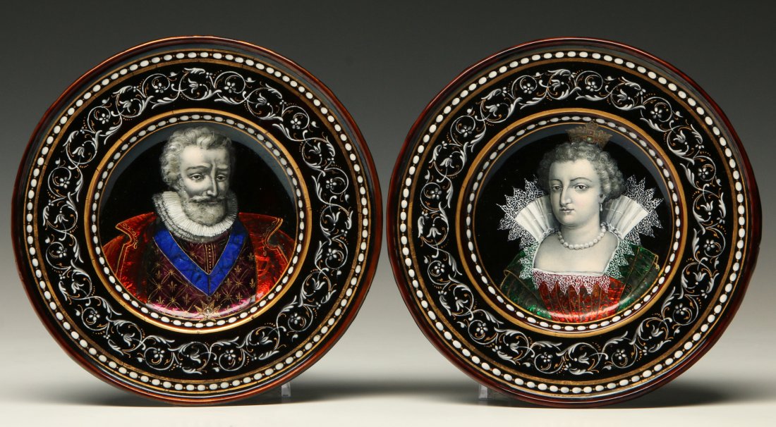 A PAIR OF 19TH C. LIMOGES KILN FIRED ENAMEL PLAQUES: A pair of circular enamel on copper portrait plaques of very fine detail depicting King Henry IV and his second wife Marie de Médicis. Each measures 6.5 inches in diameter. Unsigned.