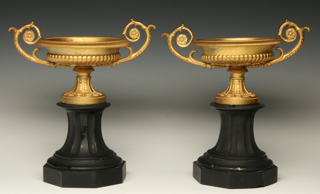 A PAIR OF LATE 19TH CENTURY ORMOLU AND SLATE TAZZA: Gilded bronze tazza on a fluted slate columnar base with octagonal foot. Each measures 9.5 x 8.75 inches. Considerable repair to one.