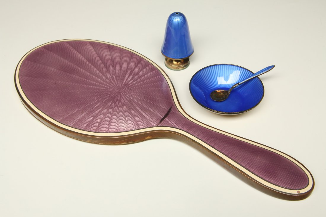 GUILLOCHE ENAMEL MIRROR AND DANISH STERLING SILVER: Includes a boxed silver gilt master salt and spoon with matching shaker signed David Andersen, plus an 11.25 x 4.25 inch hand mirror.