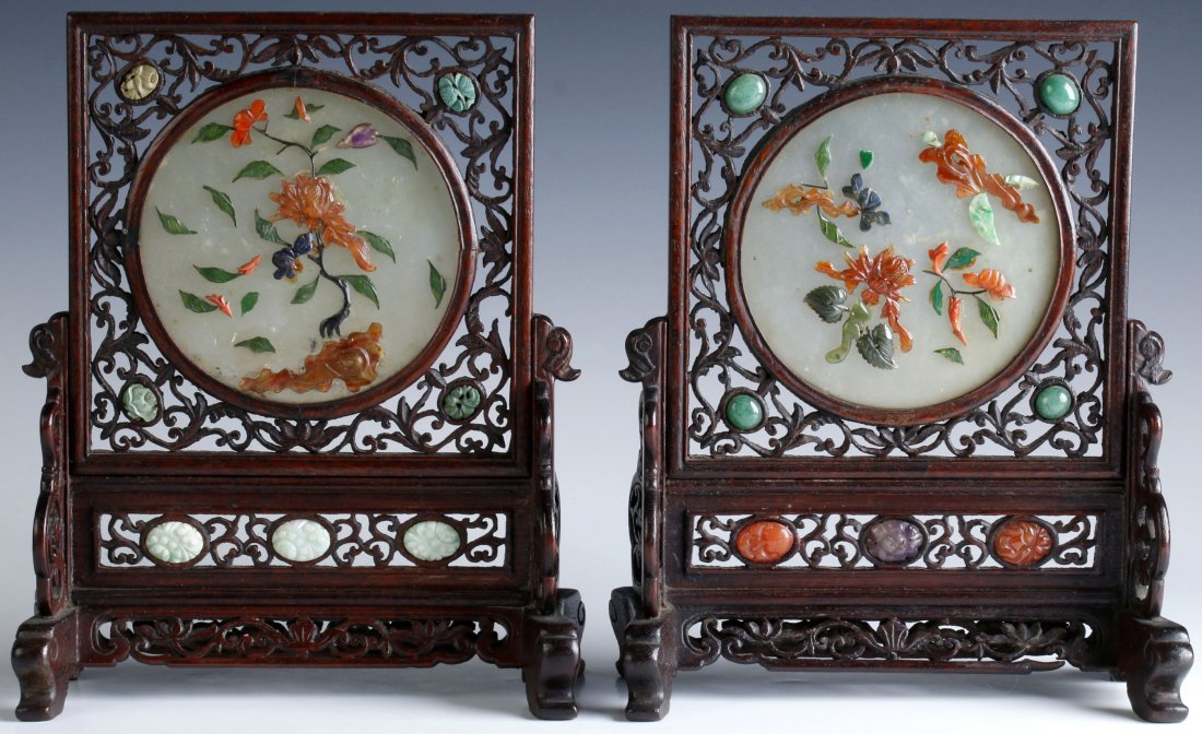 PAIR EARLY 20TH C. CHINESE JADE INSET TABLE SCREENS: Chinese, pair of openwork hardwood table screens with inset circular jade panels having floral designs with inlays of other hardstones, 20th century. Pair measures 8.5 x 7 inches,
