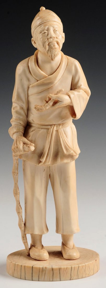 AN ANTIQUE CHINESE CARVED IVORY FIGURE: A 19th century Chinese carved ivory depiction of a man with walking stick holding a smoking pipe. Measures 10 x 4 inches. This lot will be accompanied by a signed affidavit from the client that this o