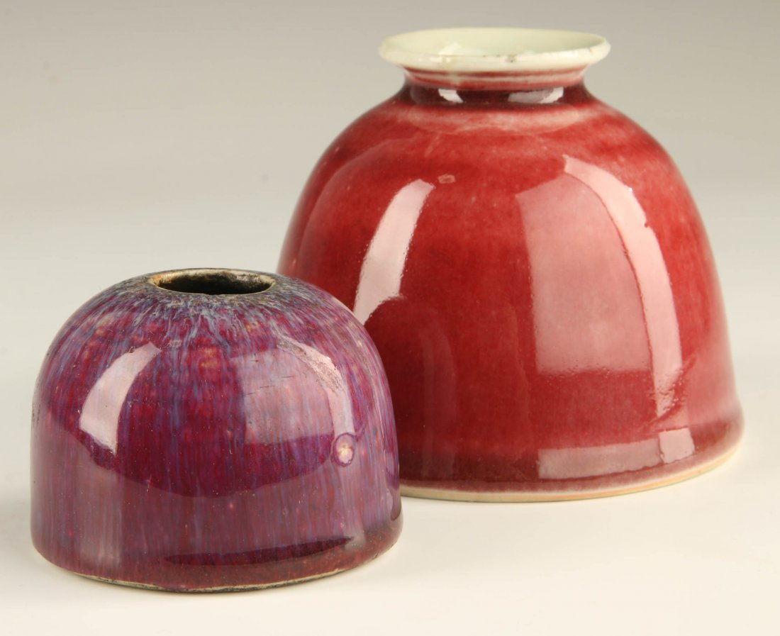 TWO ANTIQUE CHINESE GLAZED PORCELAIN BRUSH WASHERS: Two Chinese domed porcelain brush washers, one of flambé glaze, the other larger with oxblood glaze, 19th to early 20th century, both unmarked. Measurements of 2 x 2.75 and 3.5 x 4.25 inches.