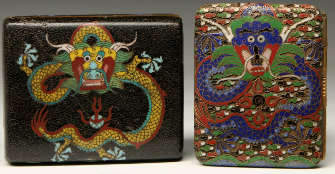 CHINESE CHAMPLEVE AND CLOISONNE DRAGON MOTIF CASES: A champlevé enamel case with dragon measures .5 x 3.5 inches and cloisonné enamel dragon box measures 1.5 x 4 inches.