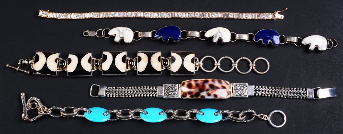 FIVE STERLING BRACELETS WITH TURQUOISE, COWRY, MORE: Turquoise link bracelet with sterling, cowry shell bracelet, dyed bone, polar bear figural bracelet with semiprecious and a vermeil bracelet with crystals, all are marked for sterling, wrist sizes 6.5