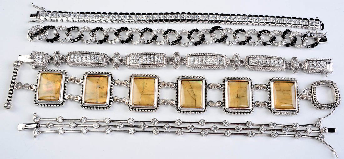 FOUR STERLING BRACELETS WITH CUBIC ZIRCONIA (1 of 10)