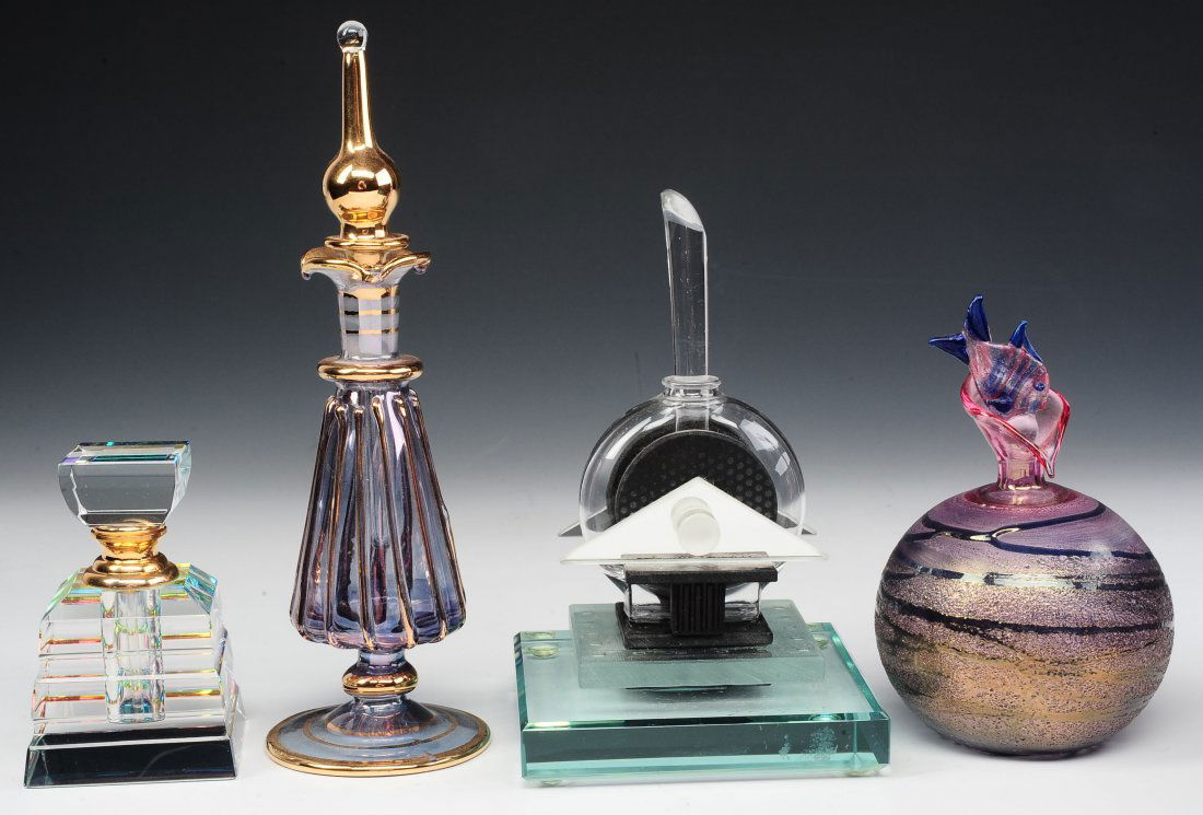 FOUR PERFUME BOTTLES OF ARTISTIC DESIGN (1 of 9)